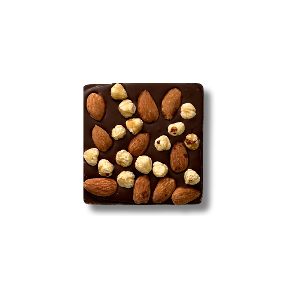 NUT BURST 60% - CHOCOLAT AU LAIT ÉCLATS D'AMANDES ET NOISETTES - EL SALVADOR